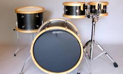 5" X 8" tom, 5.5" X 10" tom, 10" X 14" floor, 15" X 20" bass
KELLER maple shells
8 ply
black stained shells with tung oil finish
maple hoops
aluminum lugs
AQUARIAN heads
 
double tom stand not included