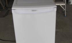 White Danby counter height 3.2 cuic foot bar fridge with freezer, excellent condition, only used one year in dorm room. Model DCR34W