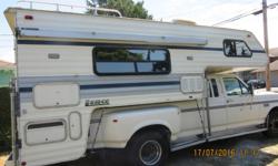 Well cared for 1989 model with extra lighting & storage
Island Owned since new - only 2 owners
Length: 11' 3"
Generator
Air Conditioner
Solar Panel
North-South Queen Size Bed
Separate Shower in bathroom
4 Burner Stove
Microwave
Fridge 2009
Two 30lb