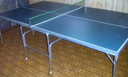 Very nice folding green games table in excellent condition. Includes net but no balls or paddles. Comes from non-smoking home. Dimensions 9 feet x 5 feet x 30 inches high. Table top is 3/4 inch thick with reinforcing metal frame. Price firm. Please call