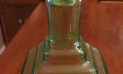 green depression glass, original stopper, possibly Hocking, over 50 years old, beautiful piece, 10 inches high with topper, no visible chips or scratches, excellent condition, holds 32 oz of liquid
asking $25.00