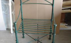 Steel designer chair, indoor outdoor use. Back height 38 inches, width 23 Inches, 19 inches in depth. excellent condition