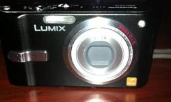 Lumix DMC-FX10 digital camera for sale (black n silver) in excellent shape.Less than 1 year old.Works perfect.Comes complete with USB chord and batery charger