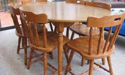 Maple dinette set -- 2 leaves with 6 wood chairs