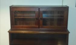 Solid wood dining room cabinet for dishes, glasses and china ware in excellent condition.