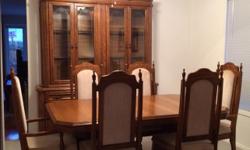 Oak Dining Set. Table (L66" x W42"), plus 2 leaves (15" each).
Hutch (L66" x W 14Â½ x H57") with light.
Buffet (L72" x W17" x H 32").
6 Padded Chairs.