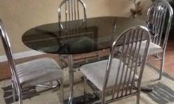 Top glass, immaculate condition dining room set with 4 chairs for sale.
This ad was posted with the Kijiji Classifieds app.
