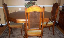4 matching high back chairs
cushion seats
leaf in table
large 4 banister pedestal
Oak finish
1 owner
will entertain all offers