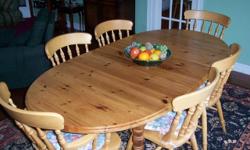Solid pine farmhouse style dining table.
Length 61", extends to 77" with integrated centre section, 39" wide
Very Good condition. Price firm.
(Sorry, the chairs are gone)