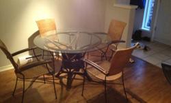 Dinning room table with glass top with 4 chairs
This ad was posted with the Kijiji Classifieds app.