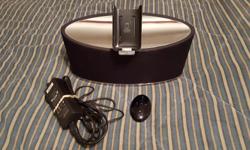 For sale is a Bowers and Wilkins Zeppelin Mini docking speaker for older models of iPods and iPhones. Great sound. Works perfectly. Comes with a remote and one adapter; however, adapters are not required for use. Can be used with newer phones if proper