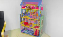 4 Story wooden doll house with elevator and 17 pieces of furniture.
