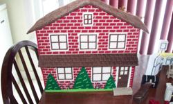 Doll house completely handcrafted from plastic canvas and yarn, washable. More than enough furniture to fit in it. Dimensions are 16"h x 14"w x 7"d. Asking $75.00