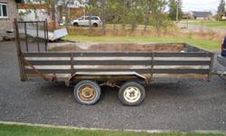 Double axle utility trailer, used mostly for hauling two quads, good for lumber, moving , gravel etc. Has fold down drive on ramp. Axles have 12 " wheels and there is two brand new tires on rims for spares included. Lights are good and working , has heavy
