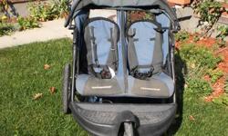 BABY TREND EXPEDITION . Double Jogging stroller.  excellent condition.. No rips or tears.  Great in the snow. folds flate with quick detach wheels. storage tray on top and storage area underneath. Blue fabric and black frame. 
live in Elora but work in