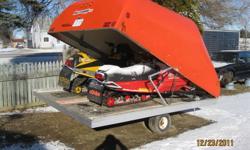 Perty much a brand new double wide sled trailer.
- Alumium frame
- Fiberglass top (Orange)
- the sleds in the pictures are NOT for sale just the trailer
 
 3000 or best offer.
 
call 519-763-6349