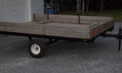 8?5?WX10?L tilt wooden deck double wide trailer. It has one year old 3500lb axle, springs and low profile 20.5/65-10 tires.  New LED lights installed and recently undercoated. All decking(1?X4?) is in great shape and the trailer is inspected until Aug of