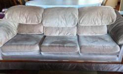 Large couch in excellent condition measures 80" in length.
Large coffee table with a glass custom top, 59" long by 23" wide.