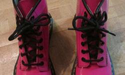 I have for sale a pair of Dr. Martens. These boots are Doc Martens "AirWair with Bouncing Soles". Like new, size 6, Acid Pink Patent Leather. Check the pictures, you will see they have hardly been worn - no tread wear.
I am asking $90 or BEST OFFER