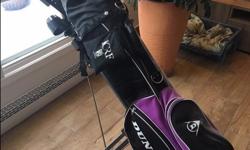 Dunlop Golf Club Set, Bag and Cart. Right-handed. Used, good condition, sold as is.
Clubs (13): driver, 3 woods, 6, 7, 8, 9 iron, sand wedge, pitching wedge, 2 putters.
Bag: Dunlop brand, self-standing (built-in tripod), multiple zipper pockets, 20 golf