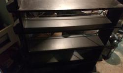 USED 4 ROW DVD STAND 25 OR BEST OFFER