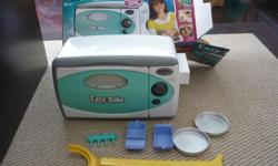 Pre-owned Easy Bake Oven. Comes with original box, instructions, and accessories as shown. Light bulb included!
Located in Barrhaven