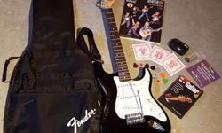 Squier by Fender - Standard StratÂ® Electric guitar: Rosewood Fingerboard, Black Metallic
Includes: Guitar (paid $384.75), guitar pics, strings, Fender tuner (paid $23.99), Guitar for kids - Method and Songbook (paid $12.59), and FastTrack Guitar Method 1