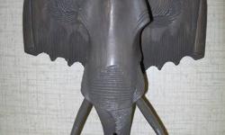 This Elephant wall hanger is great for the elephant enthusiast out there.
It's dimensions are approximately 10 1/2" wide and 12" long.
Painted all in grey is a beautiful piece for your wall.