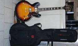 Epiphone Sheraton 2 Guitar, leather strap, and carry bag, less than a year old. Excellent condition. asking 575. No trades.