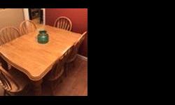 Rectangular light oak dining table with 6 matching chairs, in excellent condition, insert to seat 8-10 people.
Posted with Used.ca app