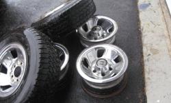 set of five w center caps two have good tires off my 1996 f-150 will fit 1970s 80s and early 90s ford and dodge trucks nice looking wheels 250obo
