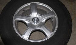 Great Looking Like New Set of Snow Tires and Alloy Rims For Sale.
Firestone Snow Tires with very low KM's and in like new condition mounted on very nice alloy rims also in like new condition. The rims are a five bolt pattern. Tire size is P235/70R16.