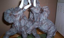 Hand cast, Hand painted and signed. Great collectable, Great gift
