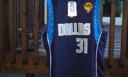 Large NBA sleeveless men's jersey. Bought in Texas. It has never been worn and labels are still attached.