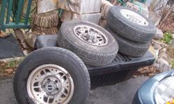 P205-75R/14 all season tires on rims from a 1994 Ford Ranger. Good Shape $100.00 OBO.