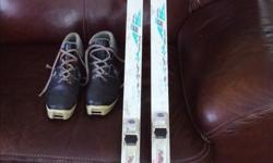 Fischer air tec skis with NNN rottefella bindings. In excellent shape. Also pair of boots. Mens 10 .