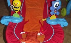 Fisher price bouncy chair. Options of vibration and music. The mobile above has a mirror on it to entertain baby. Two raddles on either side that are removable. Non smoking home.  Very soft and swaddles infant perfect for sleeping in as well.  Asking $20.