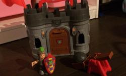 Fisher price little people knight and castle. Castle works as a carrying case for accessories.