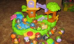 The Jungle Friends Treehouse is a busy activity play set for babies to bring their Roll-A-Rounds to life. Features ball perch, waterfall drop, peek-a-boo door, dragonfly spinner and butterfly clicker slide. Balls activate music and motion effects. Big