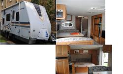 propane tanks,roof air conditioner/fan,vents,spare tire,exterior shower,skylight,shower,tub,toilet,queen bed (front),bunk beds(back),electrical hookup,lpc/co2 detectors,built in stereo,cable hookup,tv antenna,microwave,stove,oven,range