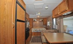 Excellent  condition, queen size bed up front, Jack and Jill bunk in the back, sleeps 7. Full size awning, outside shower, microwave, CD-AM/FM, ducted A/C, tons of storage, convenient rear side door for easy loading. Everything works perfectly, this is a