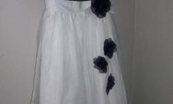 Size 7 Alfred Angelo flower girl dress.  Paid $140 for it in May and worn only once.  Eggplant colour bodice and flowers.  Very pretty.