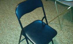 Black steel leather seat folding chair. I have 4 of em. 45$ for the 4. My roommate moved out west and left me all of his belongings, feel free to check my other ads to find out what. .