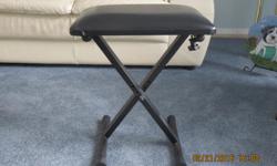 Mint condition folding piano stool. Saw very little use as we have ended up with a bench style stool.