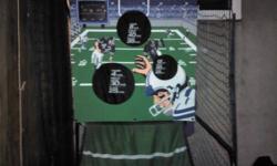 I have a arcade size football game you throw the footballs in the holes you can play with 2 people and play a full game of football really cool I just do not have room for it I am asking 150 o.b.o you can't find these anywhere it is about 2 years old that