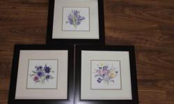 3 framed prints with a general lilac colour theme, Irises, Pansies and Freesias by V Pfeiffer. Dark brown wood frames with glass, about 17" square. $20 for the 3.