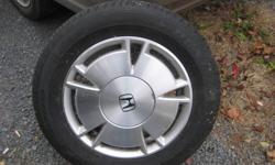 Four Dunlop SP Sport 5000 Tires. Size 195/65/15. Tread depth 9/32". Factory Honda aluminum rims. Email for more info.