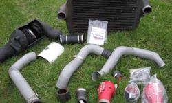 Have a complete system for FORD 6.0 L diesel , intercooler system
 
Comes complete with
-Intercooler
-piping
-intake heads 2003 - 2007 6.0 l diesel powerstroke
-all rubber boots and clamps
-AFE air intake filter and shroud
 
Everything you need to boost