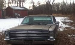 I have a Ford LtD 320 motor size It's a 1978 I think and it turns over almost got it going good shape price is 2,000 Firm