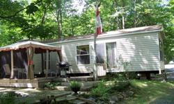 Three bedroom Cottager This Forest River Quailridge is 44ft with space for the whole family. It also has a gazebo. This one is located at Cedar Cove Resort White Lake Ontario on site K10